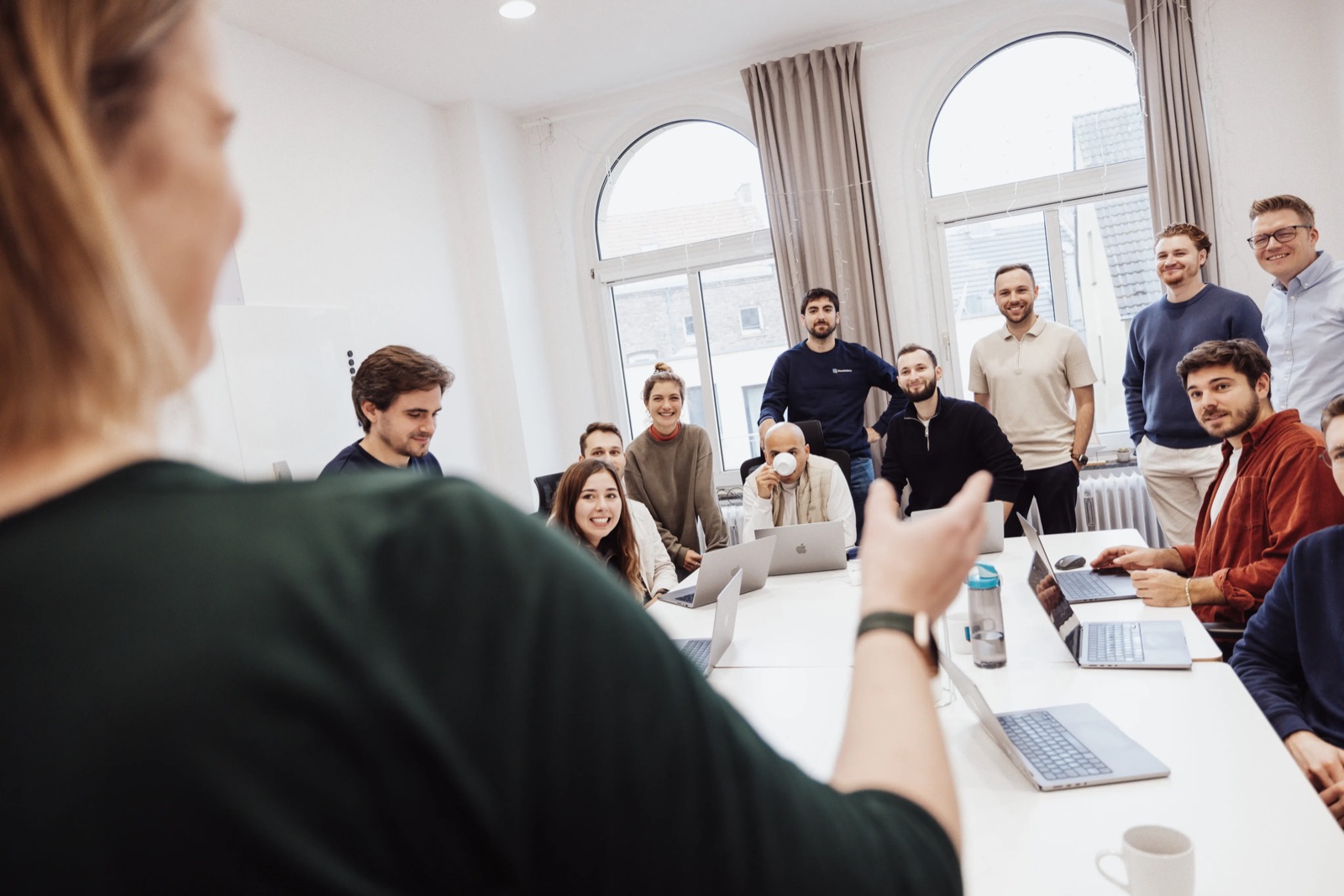 Lilith leading a workshop session with a team